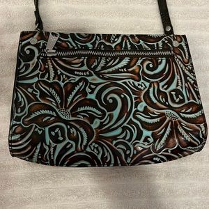 Perfect day bag for anyone! Stunning floral beachy look! Never used!